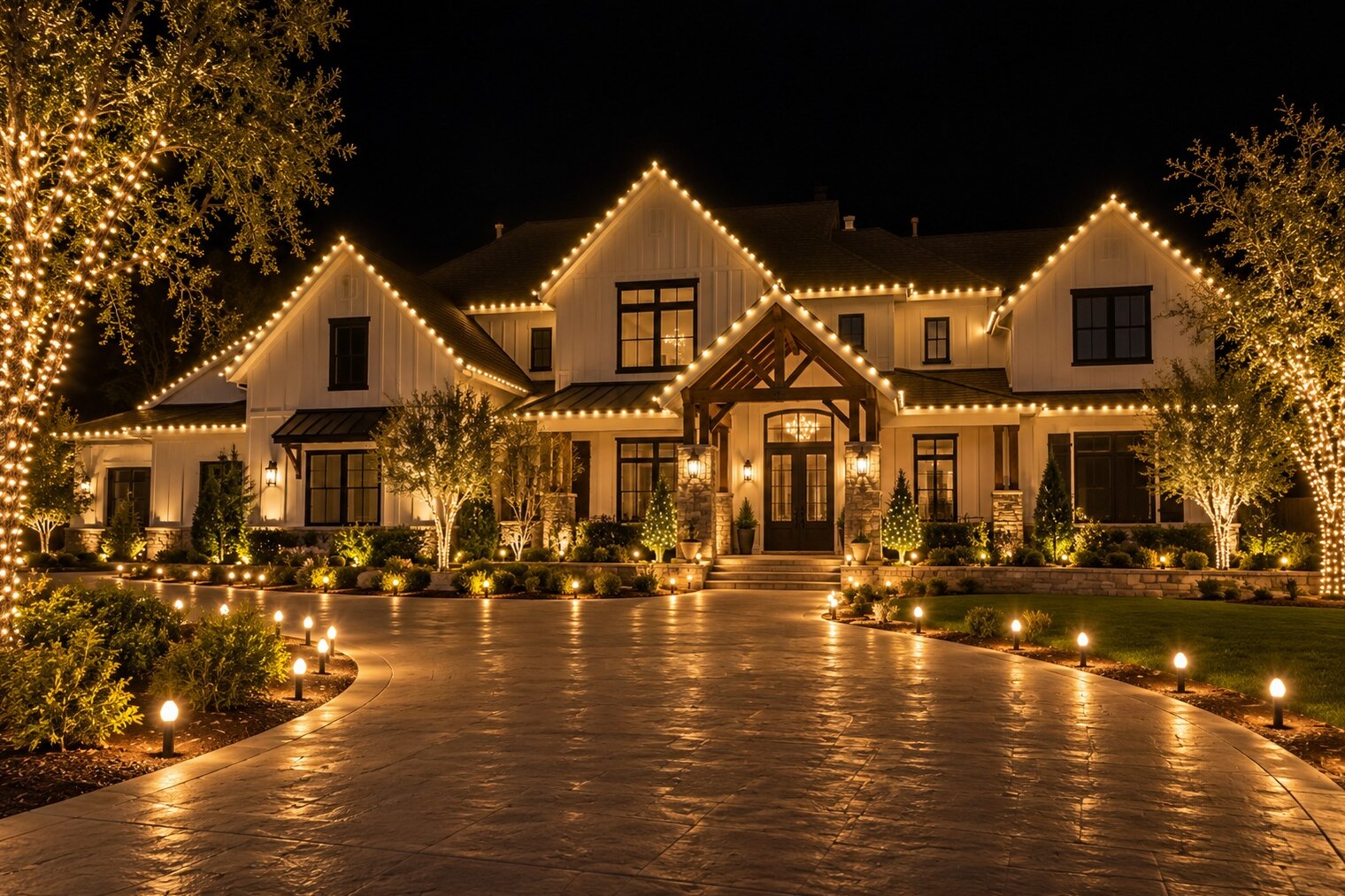 Christmas light hanging in El Dorado Hills, CA: grand modern farmhouse three gables driveway stakes warm white